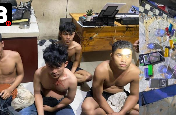 Petugas Brimob dan Polres Belawan sedang melakukan penggerebekan barak narkoba di kawasan Melati